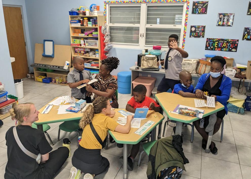 Group of students working with children in the clinic 